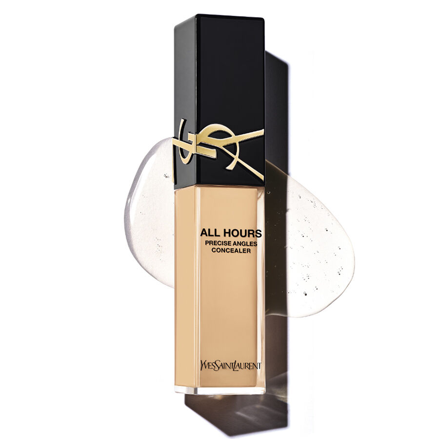 A bottle of Yves Saint Laurent All Hours Precise Angles Concealer, featuring a square black cap and a sleek design, with a swatch of the concealer behind it.