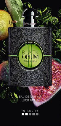 Promotional image of YSL Black Opium Illicit Green perfume featuring a textured black bottle with a vibrant green label, surrounded by fruits and coffee beans.