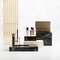 Produits de beaute YSL sur socles en marbre de luxe.
