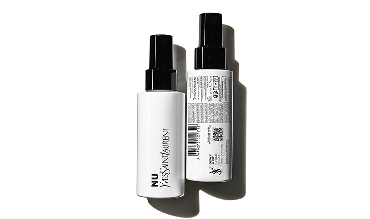Two sleek spray bottles of NU Yves Saint Laurent product, positioned against a white background, showcasing their elegant design and labels.