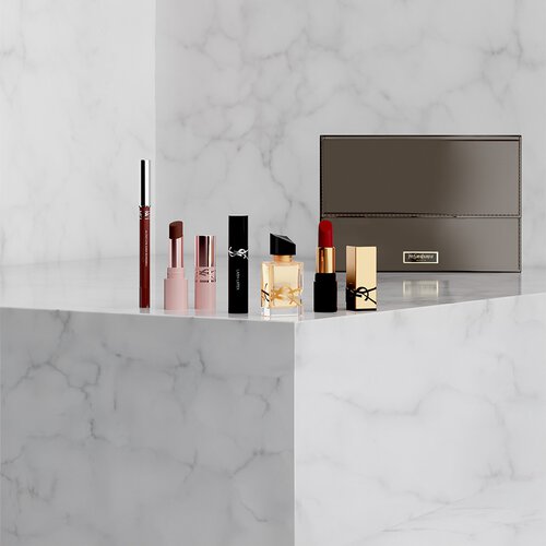 Coffret beaute YSL avec mini-produits et trousse.