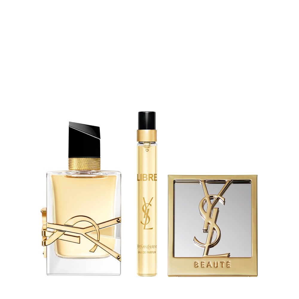 Libre Eau de Parfum fles van 50 ml naast een reisspray van 10 ml en een compacte spiegel op een witte achtergrond.