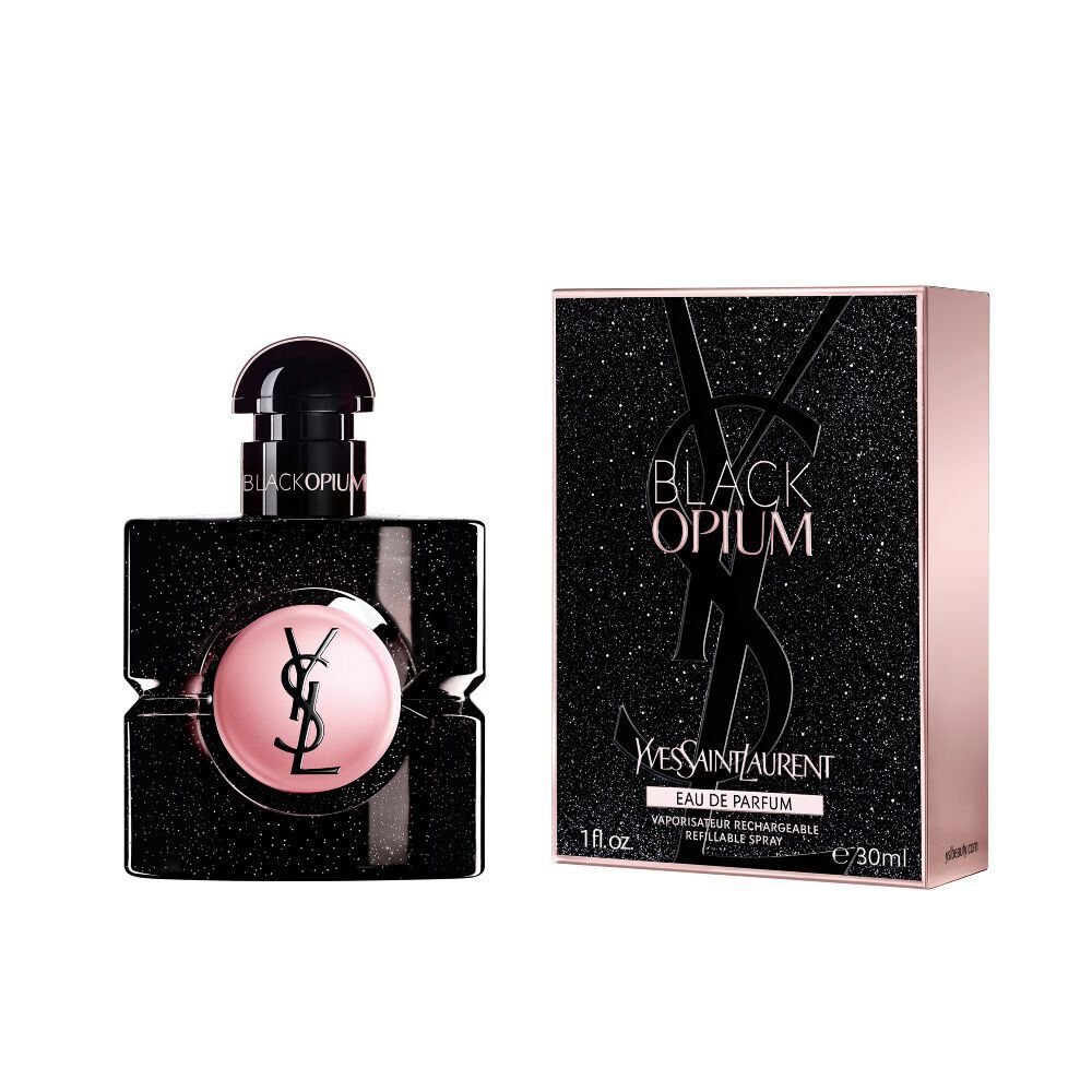 Black Opium Eau de Parfum-flacon naast het bijpassende zwarte glinsterende doosje met de YSL Cassandre.