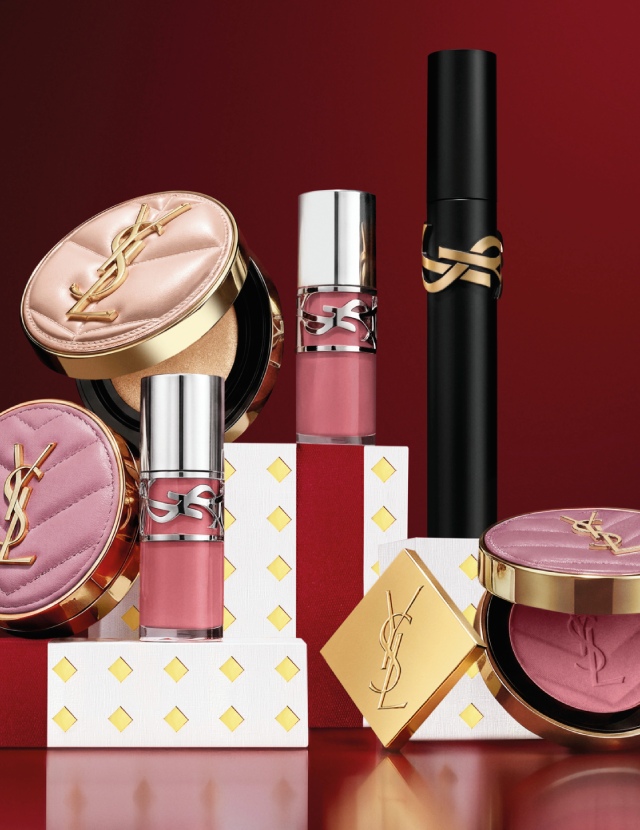 Selection of YSL makeup icons including Lash Clash mascara on festive boxes.